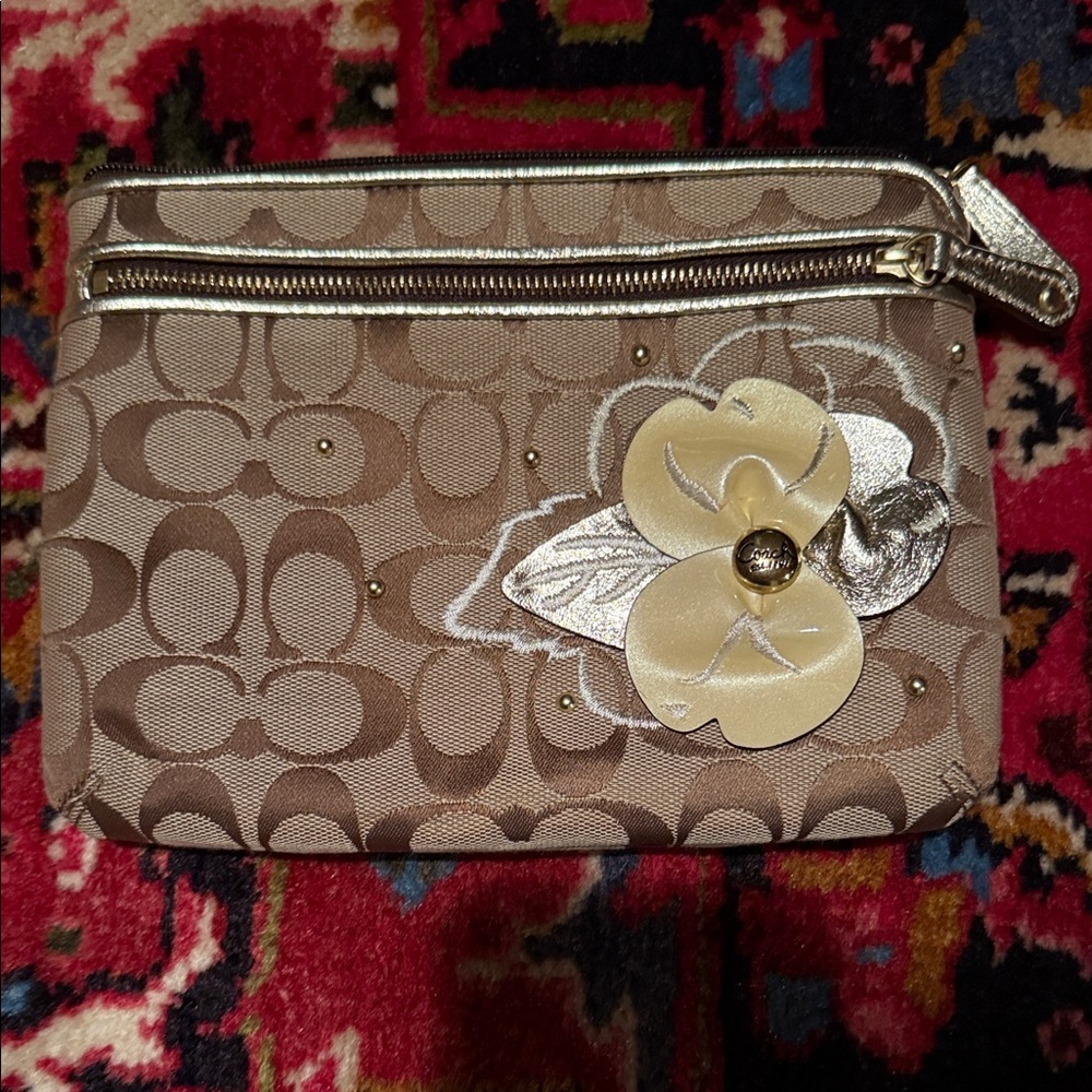 Coach Tan Signature Canvas Clutch with Gold Floral Applique